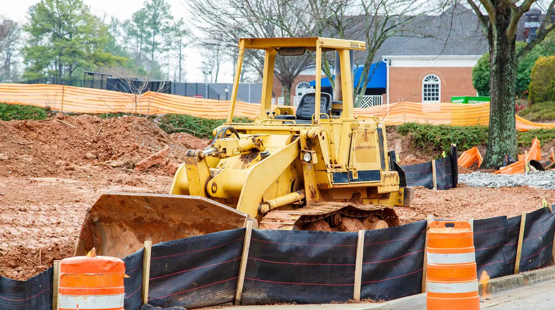 Yellow Bulldozer On A Dirt Road